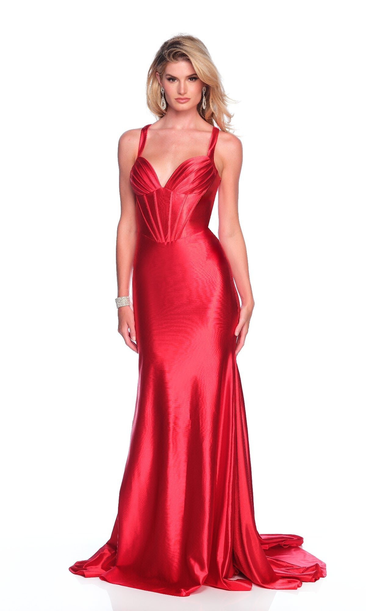 A woman poses against a white background in the Dave and Johnny 12049 Red Corset Prom Dress, a floor-length, fitted gown featuring satin fabric with spaghetti straps and a sweetheart neckline.